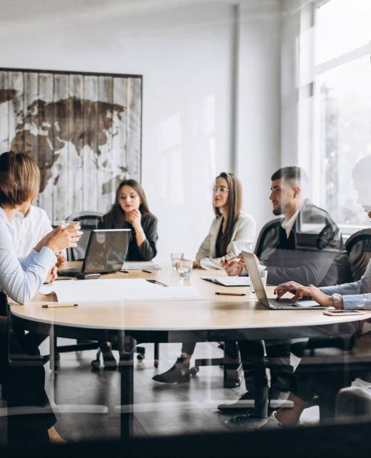 Group of people working out business plan in an office